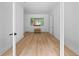 Flex room with sleek floors, white trim, neutral walls, and media setup at 575 Indian Hills Pkwy, Marietta, GA 30068