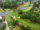 An aerial view of a beautiful golf course with lush fairways and trees at 575 Indian Hills Pkwy, Marietta, GA 30068