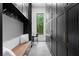 Custom mud room lockers and a convenient bench create an organized transition space at 575 Indian Hills Pkwy, Marietta, GA 30068