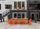 Outdoor bar with ample seating, perfect for entertaining guests near the pool and other outdoor features at 575 Indian Hills Pkwy, Marietta, GA 30068