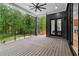 Expansive outdoor deck with ample space for seating, offering serene views of the surrounding nature and backyard at 575 Indian Hills Pkwy, Marietta, GA 30068
