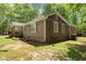 Charming single-story home with a well-maintained lawn and inviting front porch at 5855 Willis Ln, Cumming, GA 30040