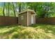 A large shed in the backyard with lots of storage space at 5855 Willis Ln, Cumming, GA 30040