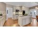 Kitchen with an island, stainless steel oven, and eat in dining area at 1215 Wynridge Xing, Alpharetta, GA 30005