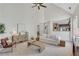 Bright living room with a vaulted ceiling and open floor plan into the kitchen at 1215 Wynridge Xing, Alpharetta, GA 30005