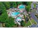 Aerial shot of the community pool area, with slides, seating, and lounge chairs at 1215 Wynridge Xing, Alpharetta, GA 30005