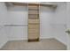 A well-organized walk-in closet with adjustable shelving and drawers for storage and organization at 1215 Wynridge Xing, Alpharetta, GA 30005