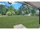 Expansive backyard featuring lush green grass and an outbuilding at 1236 Stone Mountain Lithonia Rd, Lithonia, GA 30058