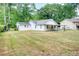 This property has a large yard with great potential at 1236 Stone Mountain Lithonia Rd, Lithonia, GA 30058