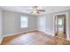 Bedroom with ceiling fan, natural light and doorway at 1236 Stone Mountain Lithonia Rd, Lithonia, GA 30058