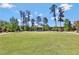 Outdoor community green space with a gazebo and lots of trees at 160 Cricket Ln, Alpharetta, GA 30009