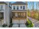 Beautiful two-story home with a two-car garage and screened-in porch at 160 Cricket Ln, Alpharetta, GA 30009