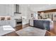 Modern kitchen featuring white cabinetry, stainless steel appliances, a center island, and hardwood flooring at 160 Cricket Ln, Alpharetta, GA 30009