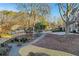 Community park features walking paths, mature trees, landscaping, and seating areas at 160 Cricket Ln, Alpharetta, GA 30009