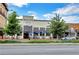 View of Smokejack restaurant, featuring outdoor seating and awnings on a sunny day at 160 Cricket Ln, Alpharetta, GA 30009