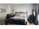 Charming bedroom featuring iron bed frame with floral patterned bedding at 118 Reunion Pl, Acworth, GA 30102