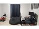 Gaming room with a computer setup, comfortable chair, and beanbag at 118 Reunion Pl, Acworth, GA 30102