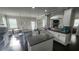 Open kitchen features a center island, modern appliances, granite countertops, and a breakfast area at 118 Reunion Pl, Acworth, GA 30102