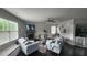 Spacious living room with fireplace, neutral color scheme, and comfortable seating at 118 Reunion Pl, Acworth, GA 30102