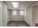 Finished basement features painted brick accents and new flooring; great for flex space or storage at 2465 Hogan Rd, Atlanta, GA 30344