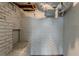 Unfinished basement space showing duct work and painted brick walls, ready for customization at 2465 Hogan Rd, Atlanta, GA 30344