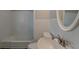 Bathroom featuring a white tile, a bathtub and a sink at 2465 Hogan Rd, Atlanta, GA 30344