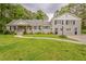 Charming brick home with a well-manicured lawn and inviting walkway at 2465 Hogan Rd, Atlanta, GA 30344