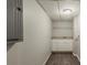 Bright laundry room with white cabinets and gray countertop at 2465 Hogan Rd, Atlanta, GA 30344