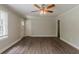 Spacious living room featuring new flooring and a neutral color palette at 2465 Hogan Rd, Atlanta, GA 30344