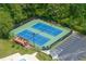 Aerial view highlighting the community's well-maintained tennis courts and convenient parking, perfect for tennis enthusiasts at 6857 Womack Ct, Atlanta, GA 30360