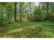 Expansive lot with mature trees offering a private backyard setting at 1861 Ardmore Nw Rd, Atlanta, GA 30309