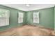 Spacious bedroom features hardwood floors, neutral paint, and abundant natural light at 1861 Ardmore Nw Rd, Atlanta, GA 30309