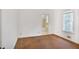Neutral bedroom with hardwood floors and a bathroom with a shower and bathtub at 1861 Ardmore Nw Rd, Atlanta, GA 30309
