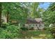Charming single-story home nestled amongst mature trees and greenery at 1861 Ardmore Nw Rd, Atlanta, GA 30309