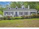 Charming home featuring a landscaped front yard and classic architectural details at 1861 Ardmore Nw Rd, Atlanta, GA 30309