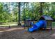 This wooded neighborhood has a community playground with play structures at 1861 Ardmore Nw Rd, Atlanta, GA 30309