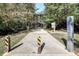 Walking path features a wooden bridge surrounded by lush greenery at 1861 Ardmore Nw Rd, Atlanta, GA 30309