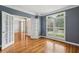 Stylish home office with hardwood floors, French doors, and ample natural light at 205 Devon Downs Pl, Alpharetta, GA 30005