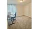 Bright bedroom with a desk setup, carpet and a modern chair for a comfortable workspace at 283 Wells Cir, Canton, GA 30114