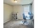 A functional room with shelving, desk, chair and computer equipment for a efficient work area at 283 Wells Cir, Canton, GA 30114