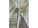 Bright hallway with stairs, wood floors, and modern decor at 283 Wells Cir, Canton, GA 30114