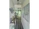Welcoming hallway with wood floors, modern decor, and an open living area at 283 Wells Cir, Canton, GA 30114