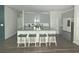 Spacious kitchen with white cabinets, island with seating, and stainless steel appliances at 283 Wells Cir, Canton, GA 30114