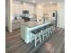 Modern kitchen with white cabinets, granite countertops, and stainless steel appliances at 283 Wells Cir, Canton, GA 30114