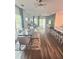 Open-concept living and dining area with hardwood floors and plenty of natural light at 283 Wells Cir, Canton, GA 30114