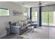 Cozy living room features a comfortable gray sectional sofa and stylish decor at 283 Wells Cir, Canton, GA 30114