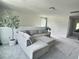 Cozy upstairs living area with a comfortable sectional sofa and tree decoration at 283 Wells Cir, Canton, GA 30114
