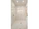 Bright bathroom with marble-tiled walk-in shower, rainfall showerhead, and sleek design at 3006 Skyland Ne Dr, Brookhaven, GA 30319