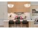 Modern kitchen with a unique island design, marble countertops, and stylish lighting at 3006 Skyland Ne Dr, Brookhaven, GA 30319