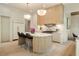 Modern kitchen featuring custom wood accents, stainless steel appliances, and marble countertops at 3006 Skyland Ne Dr, Brookhaven, GA 30319